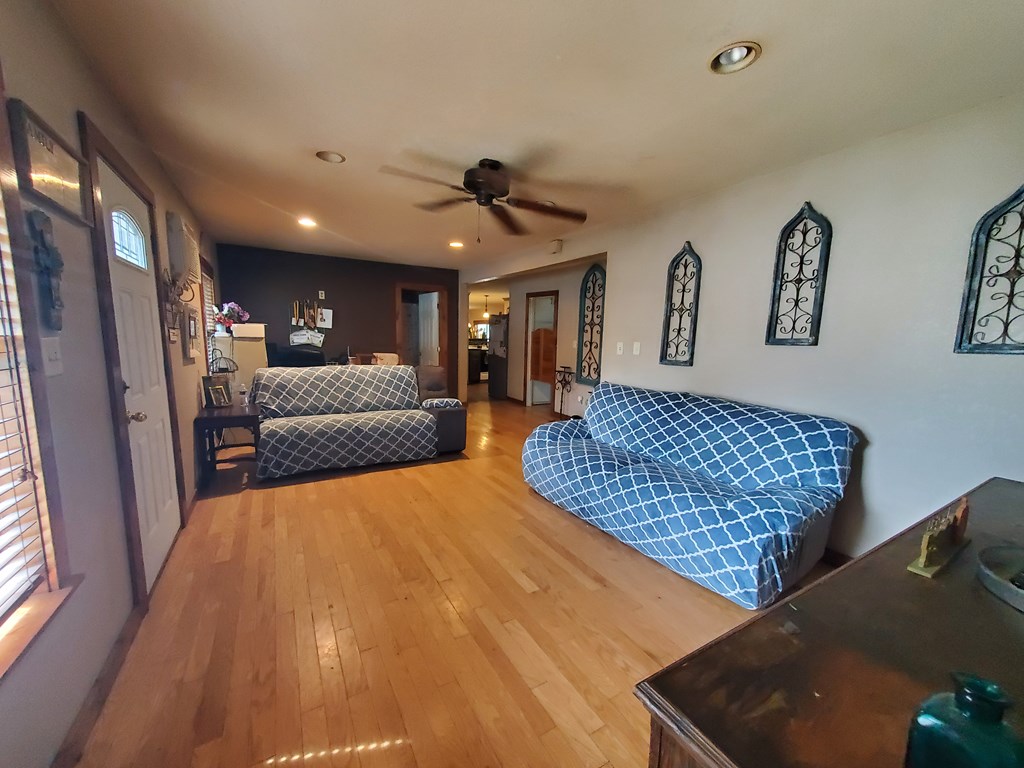 208 Houston Street Menard, TX 76859 - Photo 12 of 17 a living room with furniture and a rug