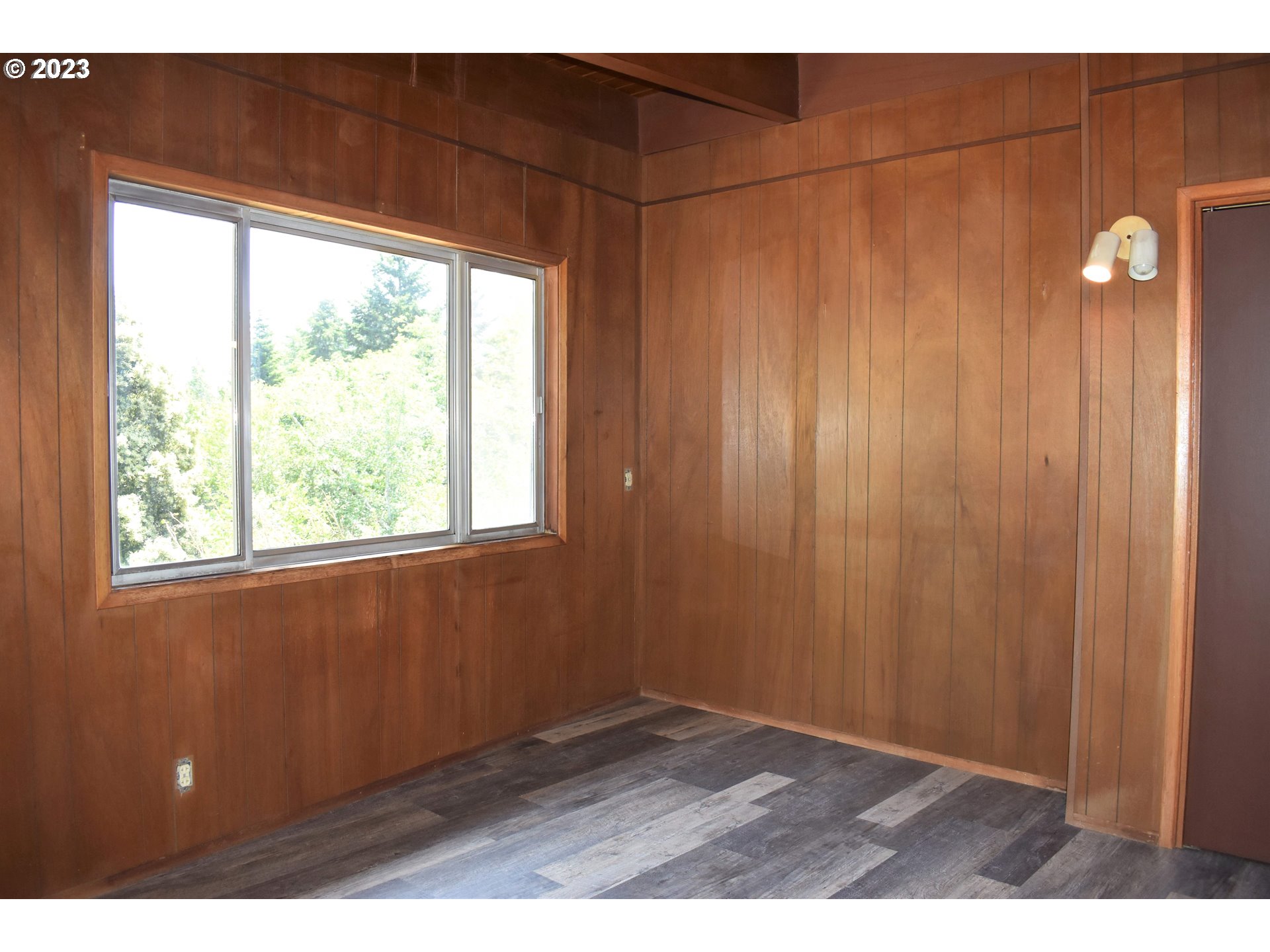 95144 Marchmont Road Gold Beach, OR 97444 - Photo 12 of 34 a view of an empty room with a window