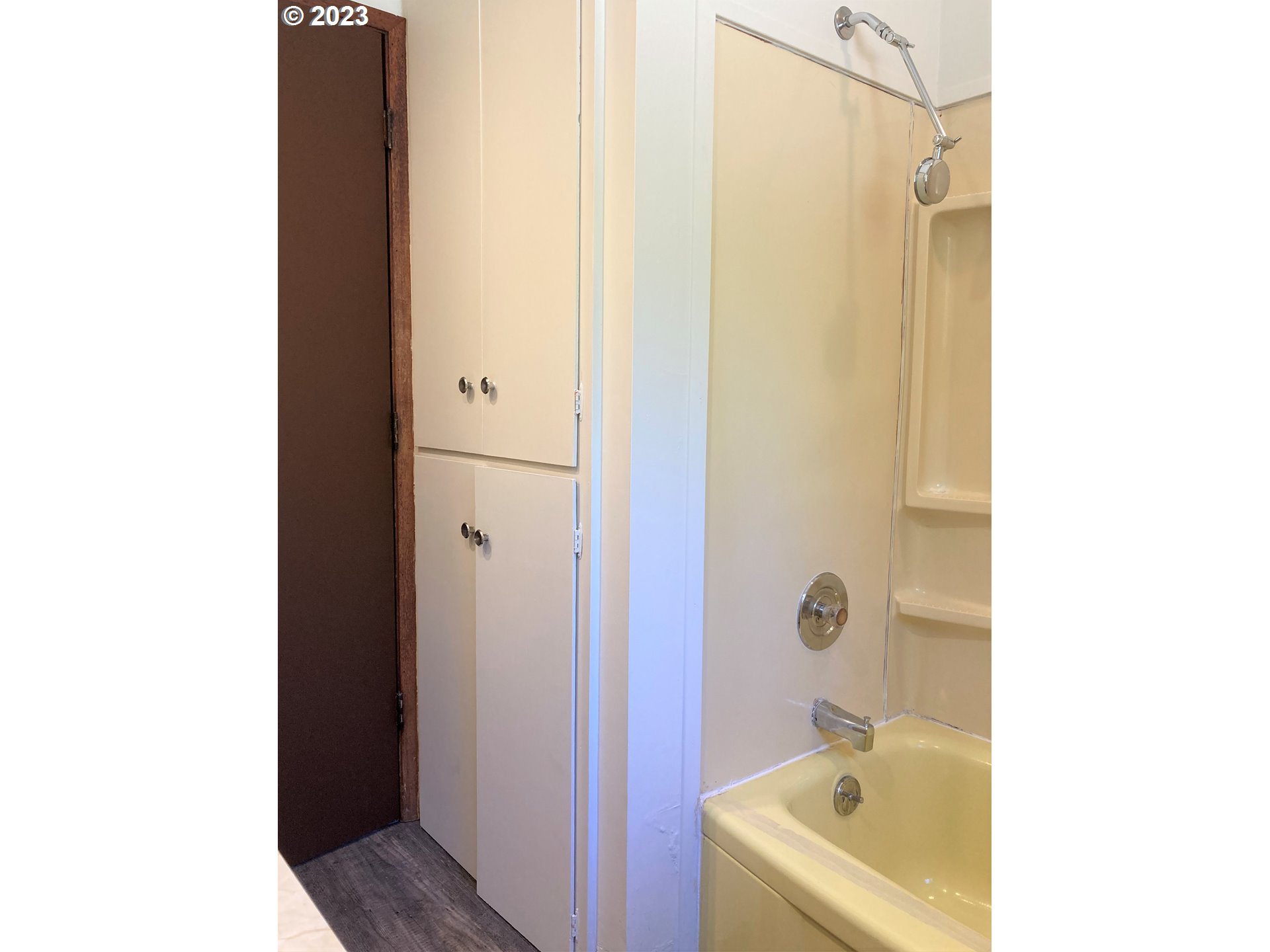 95144 Marchmont Road Gold Beach, OR 97444 - Photo 16 of 34 a bathroom with a tub shower sink and mirror