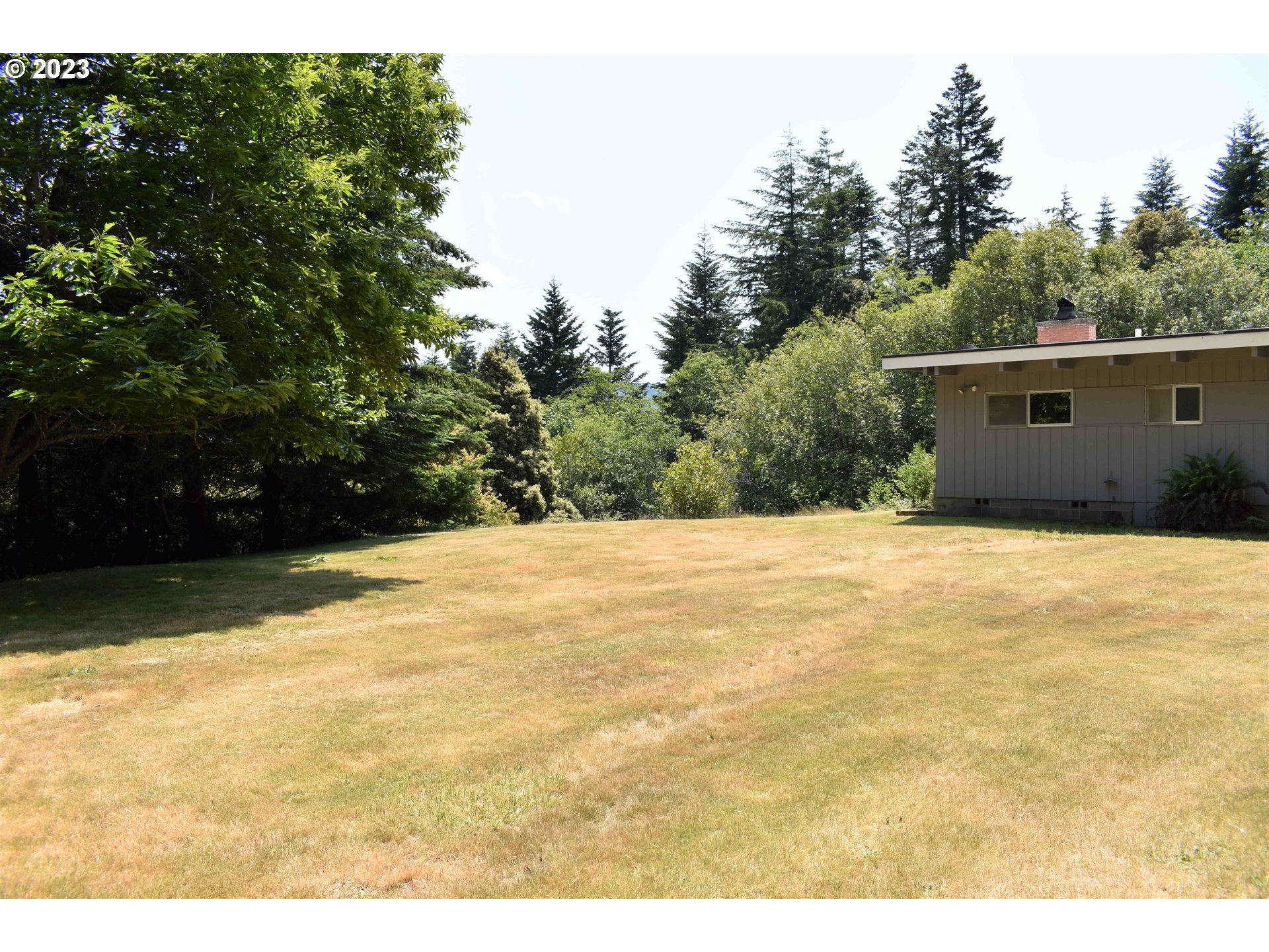 95144 Marchmont Road Gold Beach, OR 97444 - Photo 22 of 34 a view of swimming pool with an outdoor space