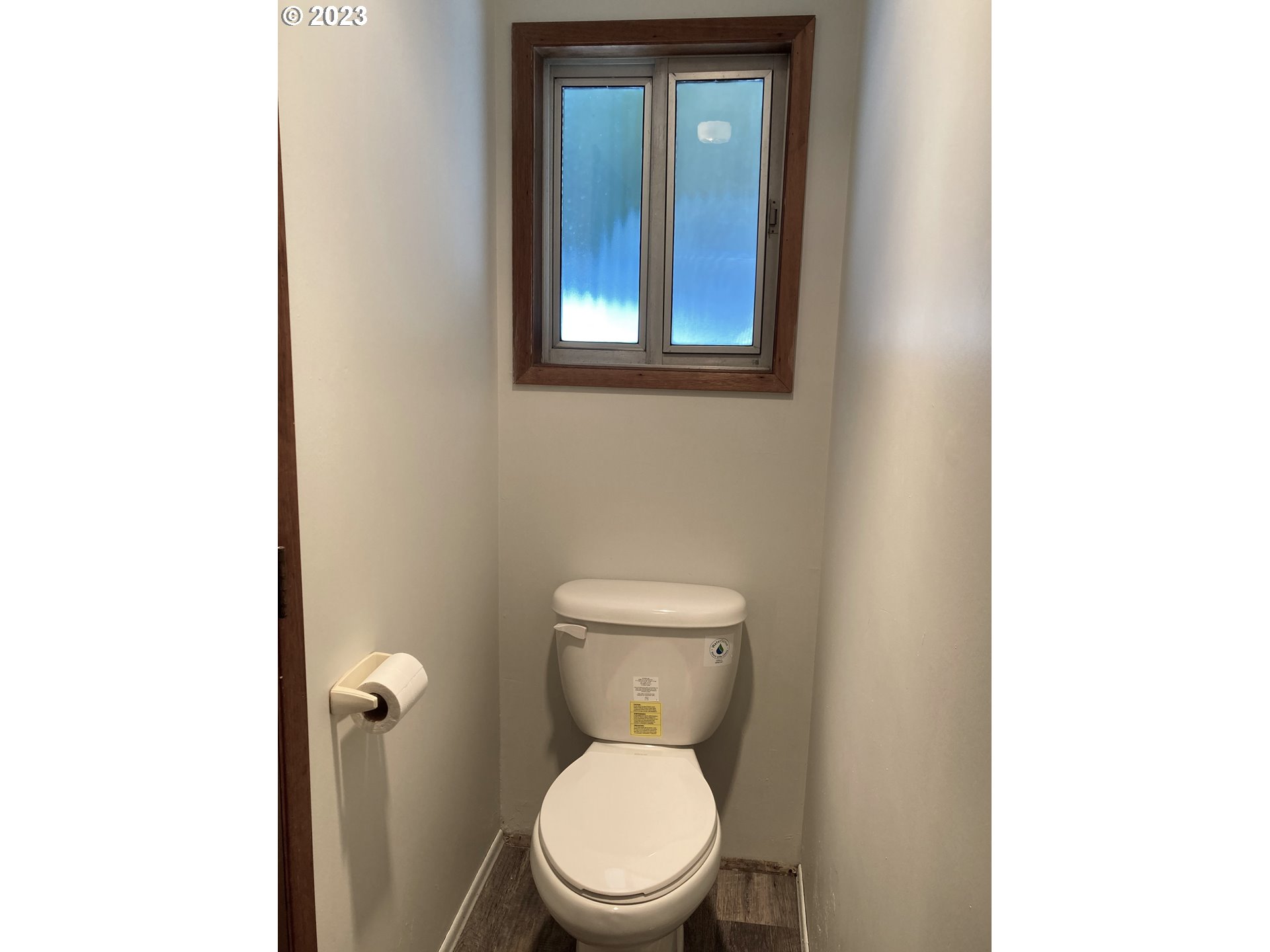 95144 Marchmont Road Gold Beach, OR 97444 - Photo 30 of 34 a white toilet sitting in a bathroom