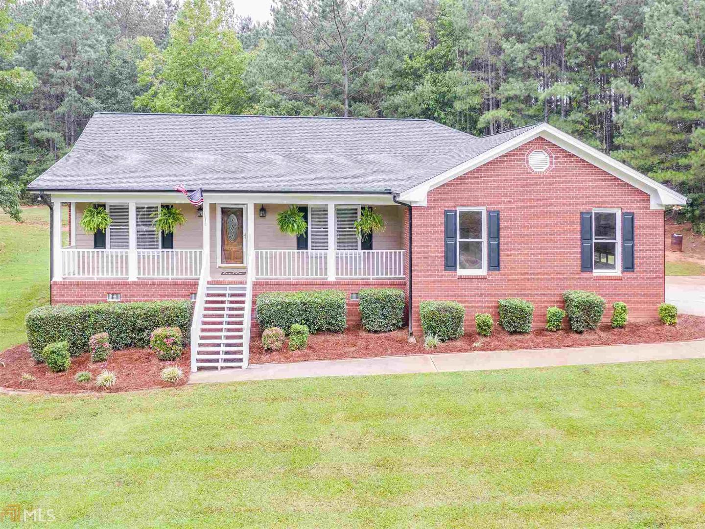 517 Hamlin Road Jackson, GA 30233 - Photo 1 of 1 front view of a house with a yard