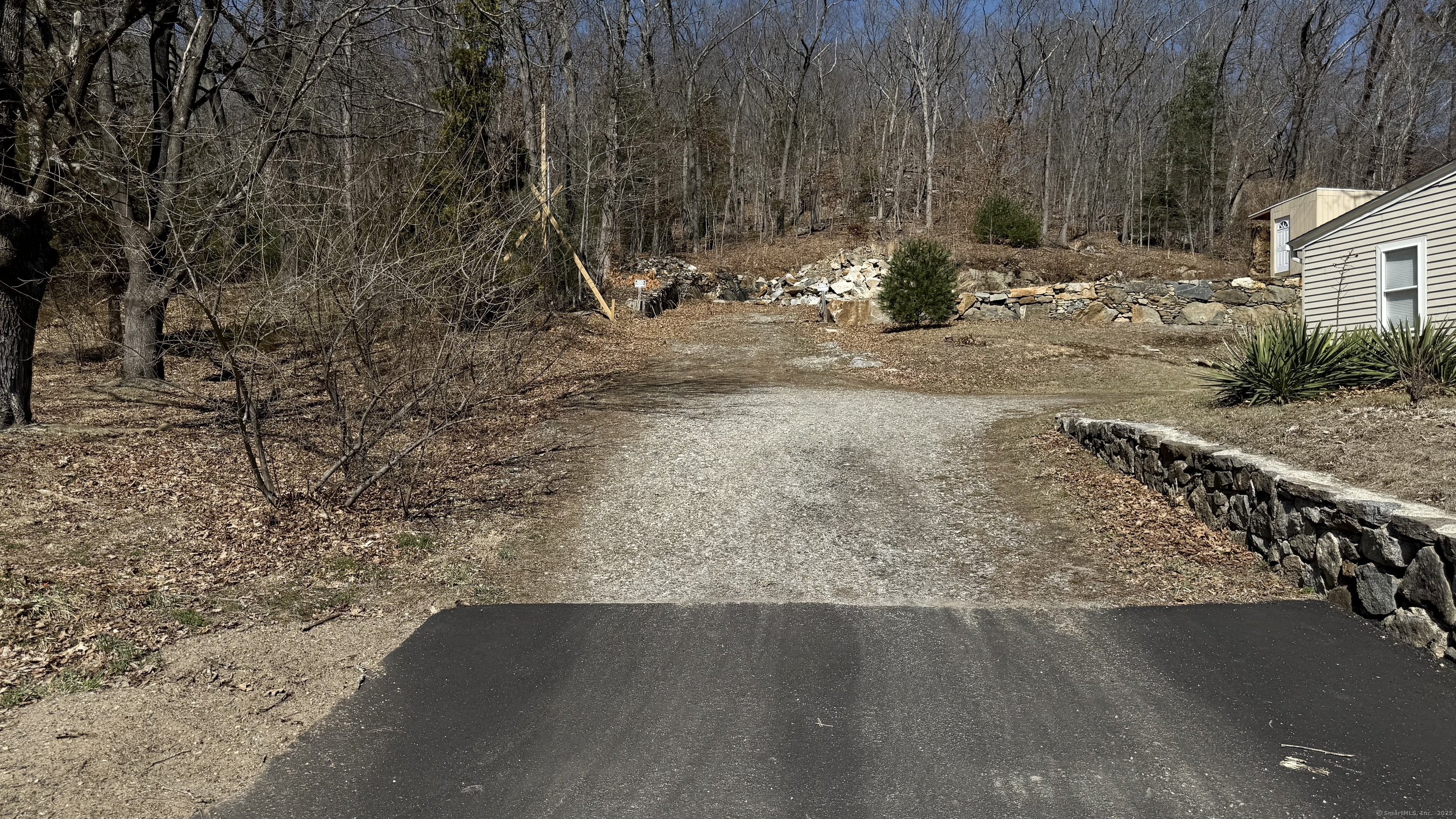 29 Ave D Beacon Falls, CT 06403 - Photo 1 of 1 a view of a yard with wooden fence