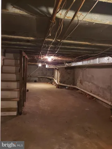 a view of an empty room with a garage