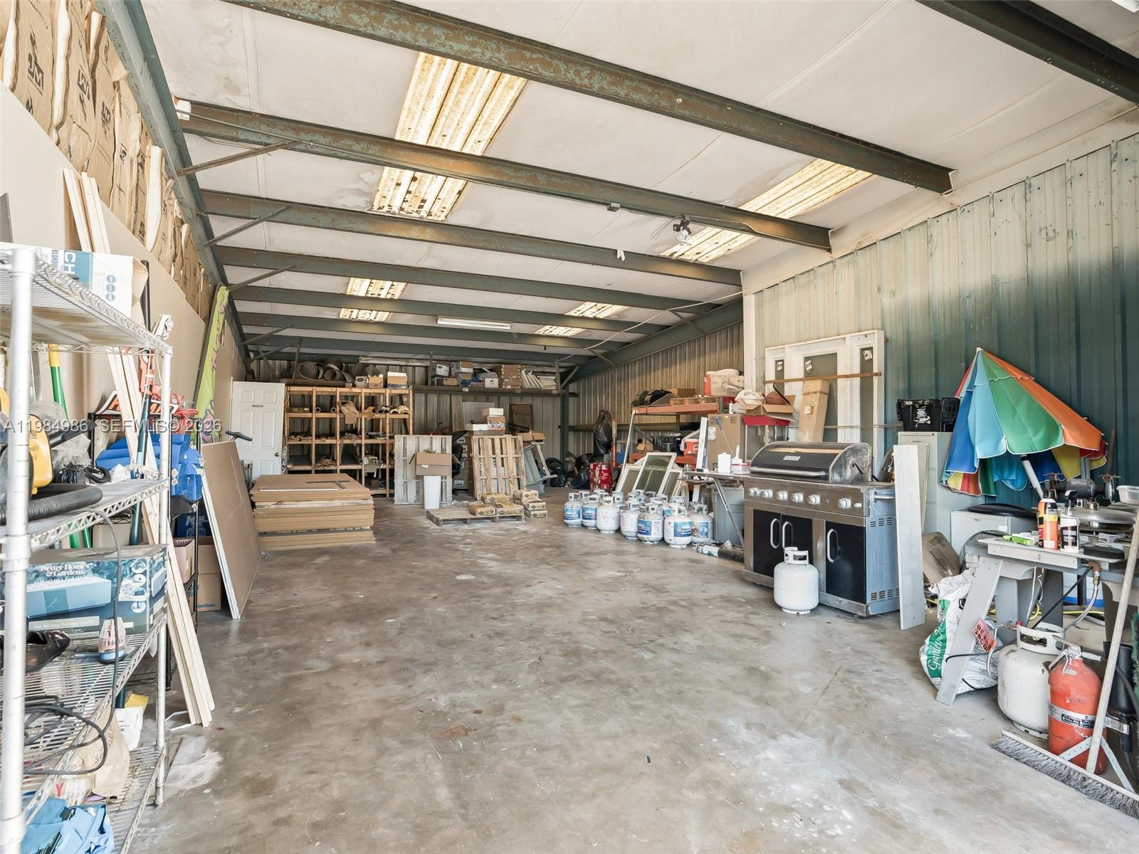 9594 Southeast Maricamp Road Ocala, FL 34472 - Photo 22 of 45 a view of an empty room with lot of stuff