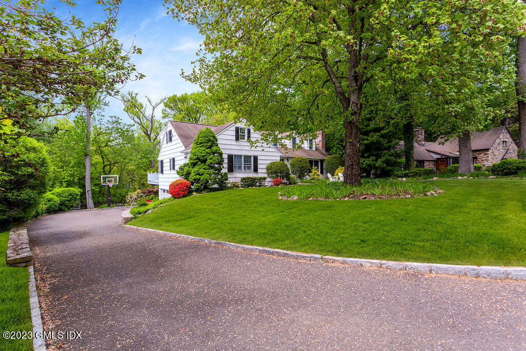 16 Crescent Road Riverside, CT 06878 - Photo 2 of 33 a view of a house with a back yard