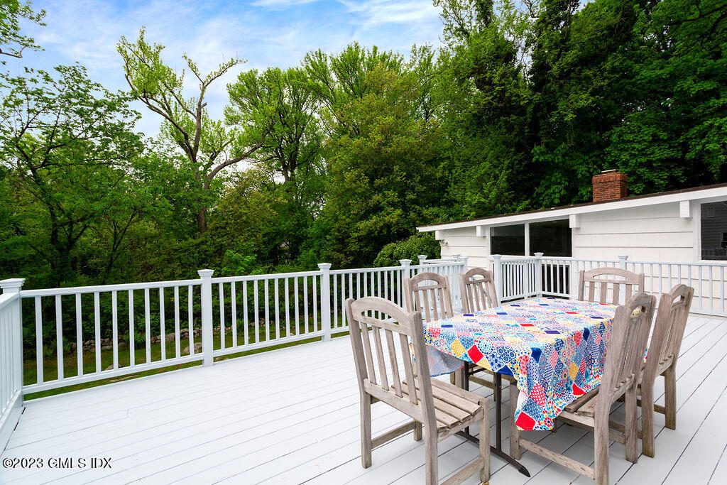 16 Crescent Road Riverside, CT 06878 - Photo 23 of 33 a view of a patio with a table and chairs