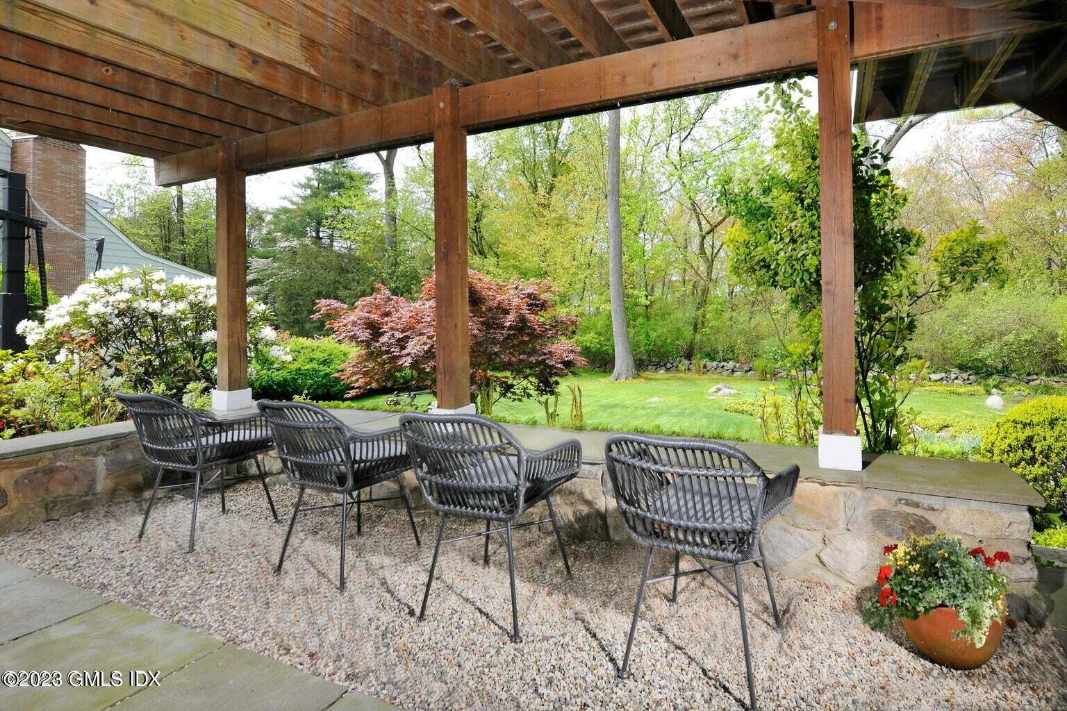 16 Crescent Road Riverside, CT 06878 - Photo 24 of 33 a view of a patio with chairs and plants