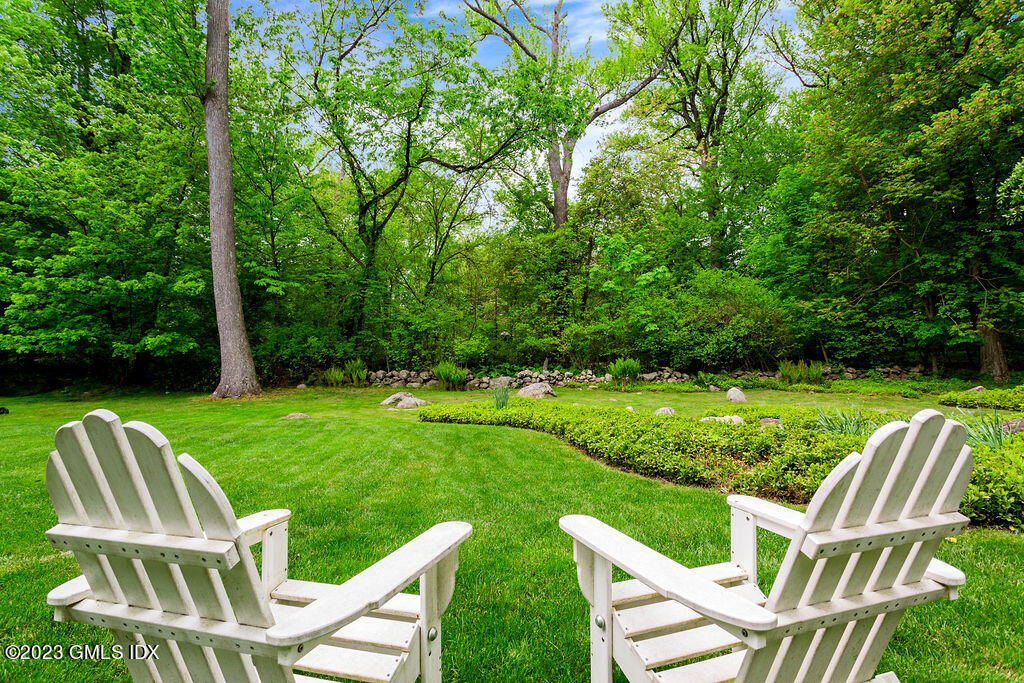 16 Crescent Road Riverside, CT 06878 - Photo 25 of 33 a view of two chairs in a yard
