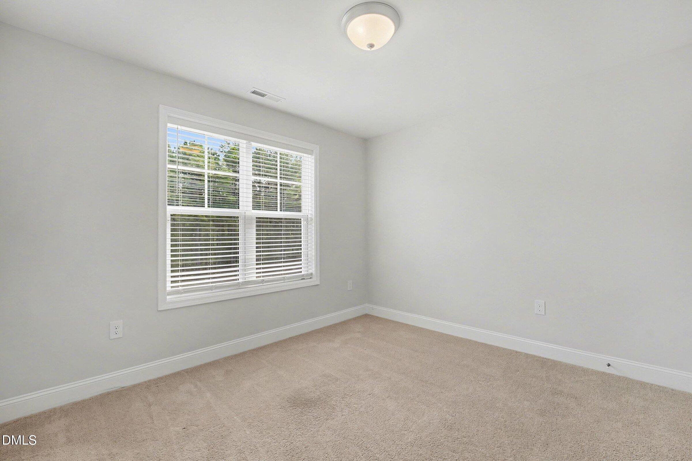 2815 Lemuel Black Road Spring Lake, NC 28390 - Photo 30 of 37 an empty room with a window