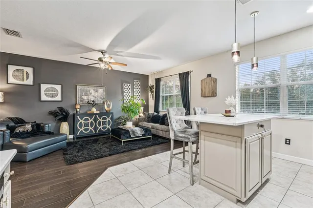 a room with gym equipment and a flat screen tv