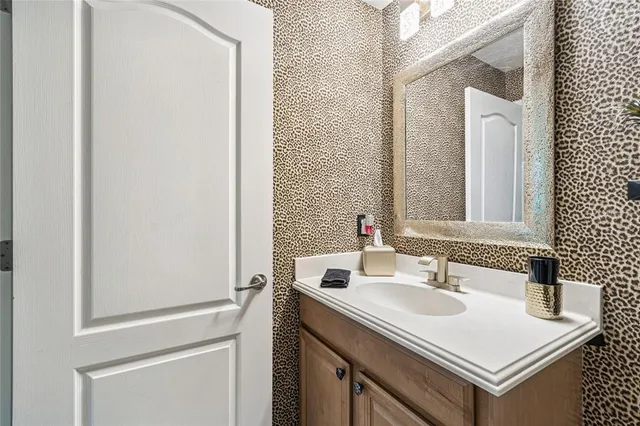 a front view of multiple houses with yard