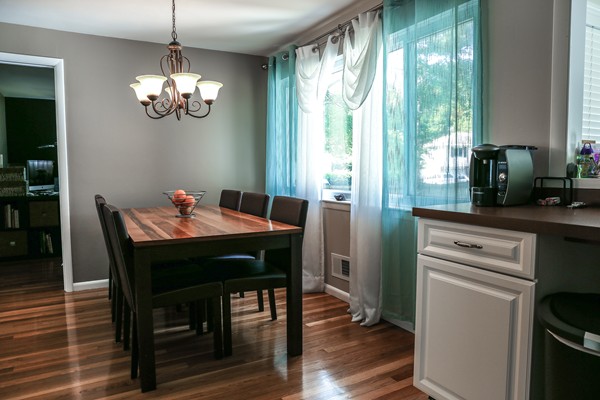 26 Livoli Road Framingham, MA 01701 - Photo 3 of 13 a view of a dining room with furniture window and wooden floor