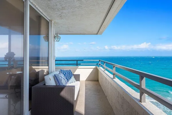 a view of an ocean from a balcony