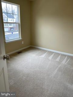 42304 Shoover Square Chantilly, VA 20152 - Photo 17 of 21 an empty room with a window