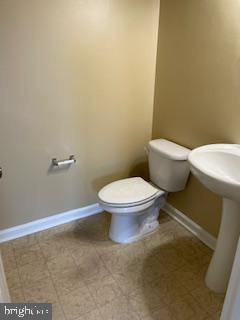 42304 Shoover Square Chantilly, VA 20152 - Photo 7 of 21 a white toilet sitting next to a white sink