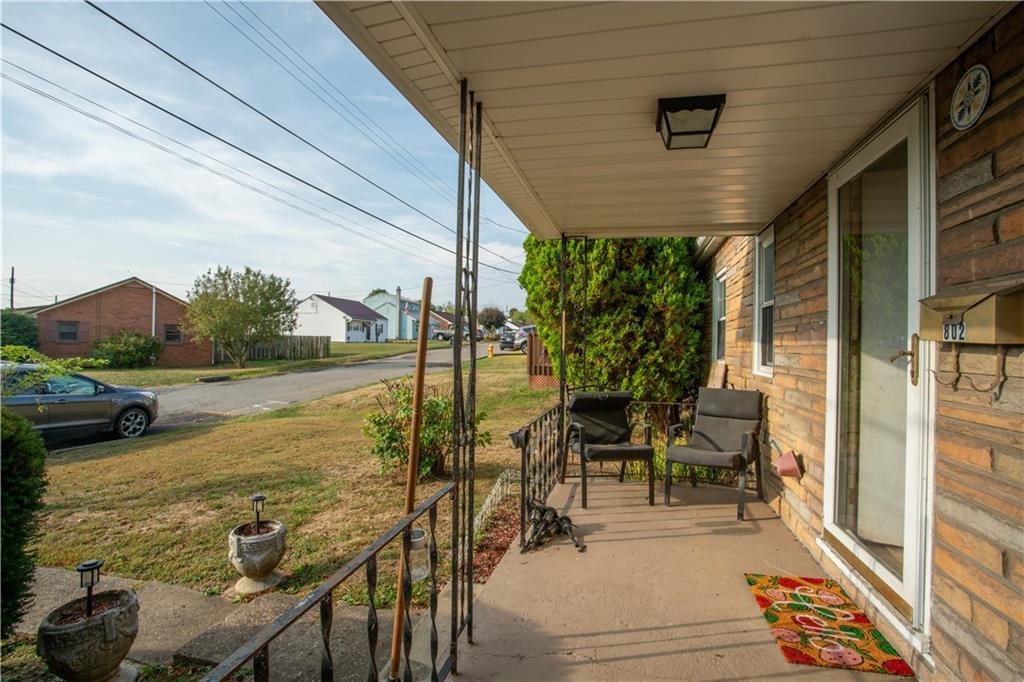 802 Summit Avenue Monaca, PA 15061 - Photo 2 of 23 a view of swimming pool with lawn chairs and couches