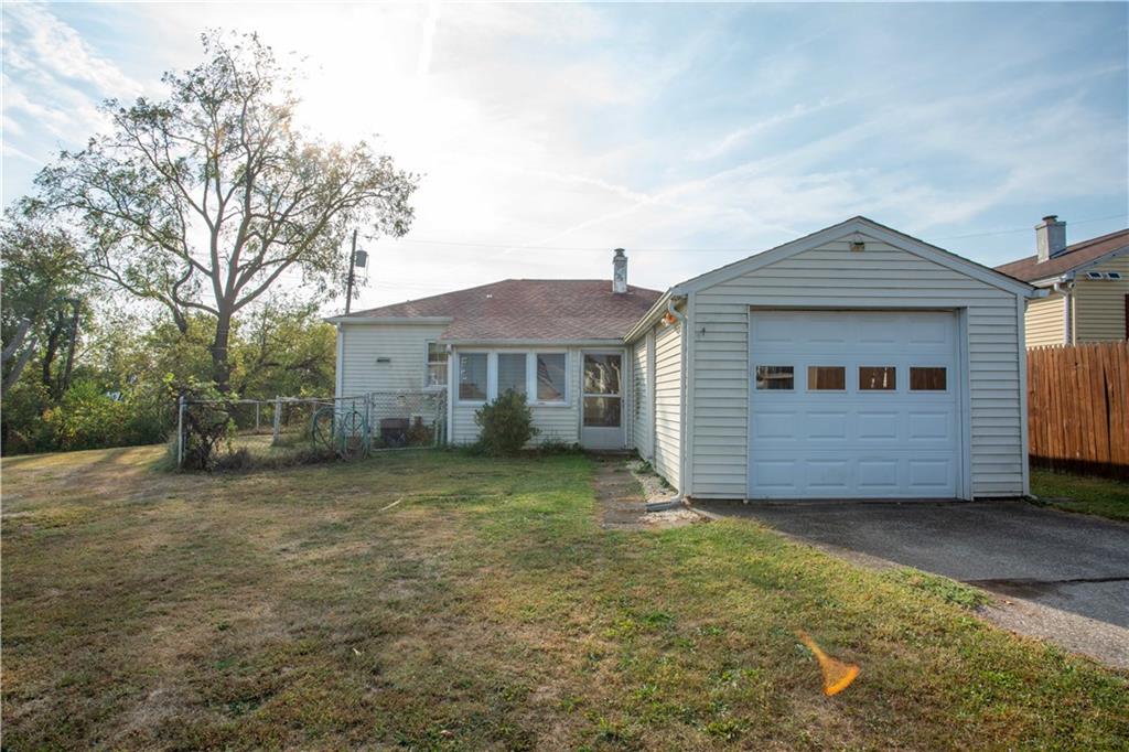 802 Summit Avenue Monaca, PA 15061 - Photo 21 of 23 a front view of a house with a garden