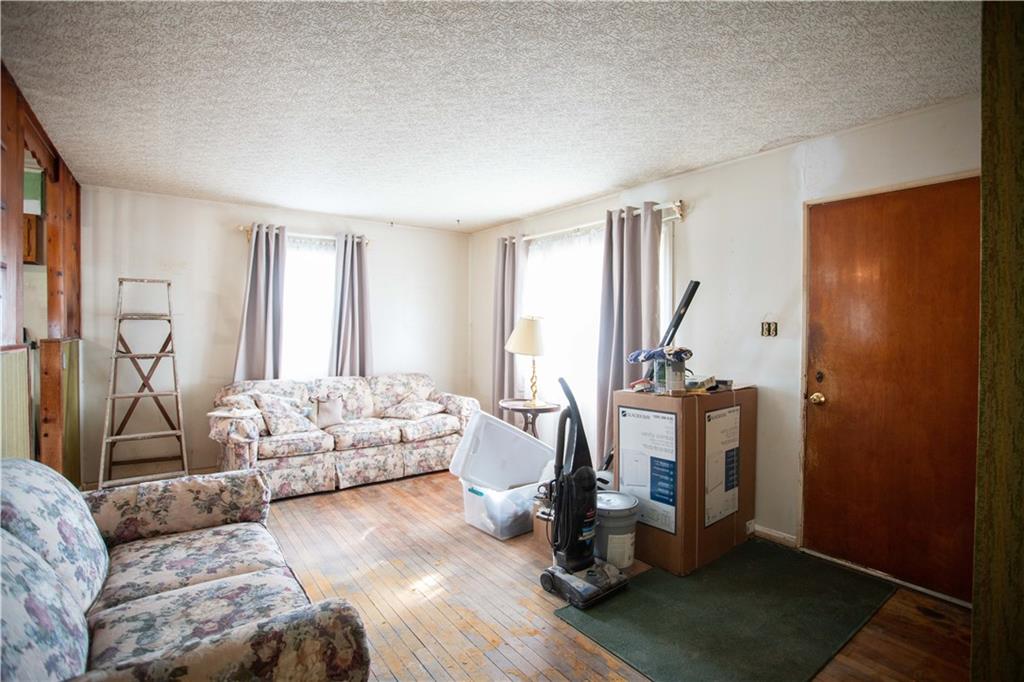 802 Summit Avenue Monaca, PA 15061 - Photo 4 of 23 a living room with furniture and a window