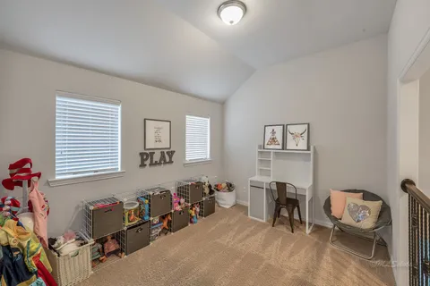 a room with furniture and a window