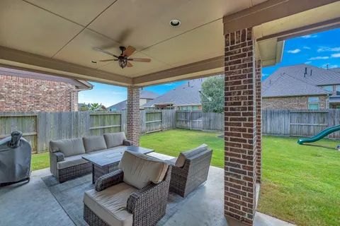 a outdoor living space with furniture and garden