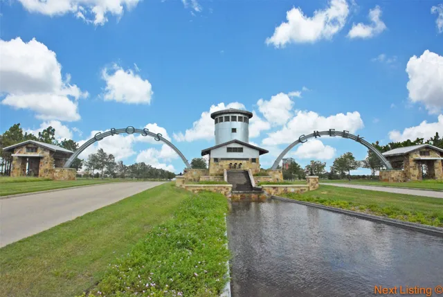 a view of a house with a yard and a chandelier