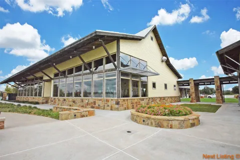 a view of a terrace with sitting area