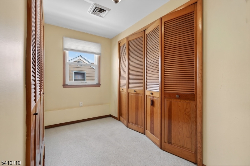 710 West Elm Street Linden, NJ 07036 - Photo 21 of 24 an empty room with windows