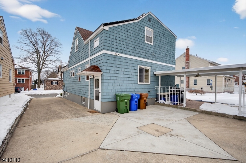 710 West Elm Street Linden, NJ 07036 - Photo 4 of 24 a view of a house with a patio