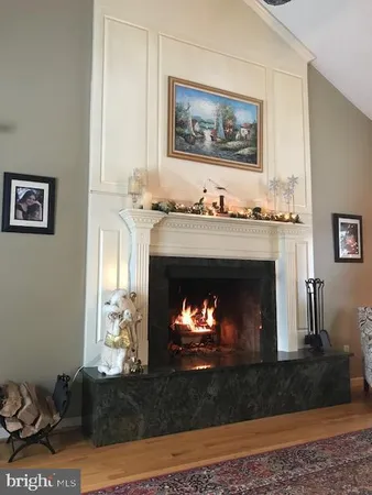 a living room with a fireplace