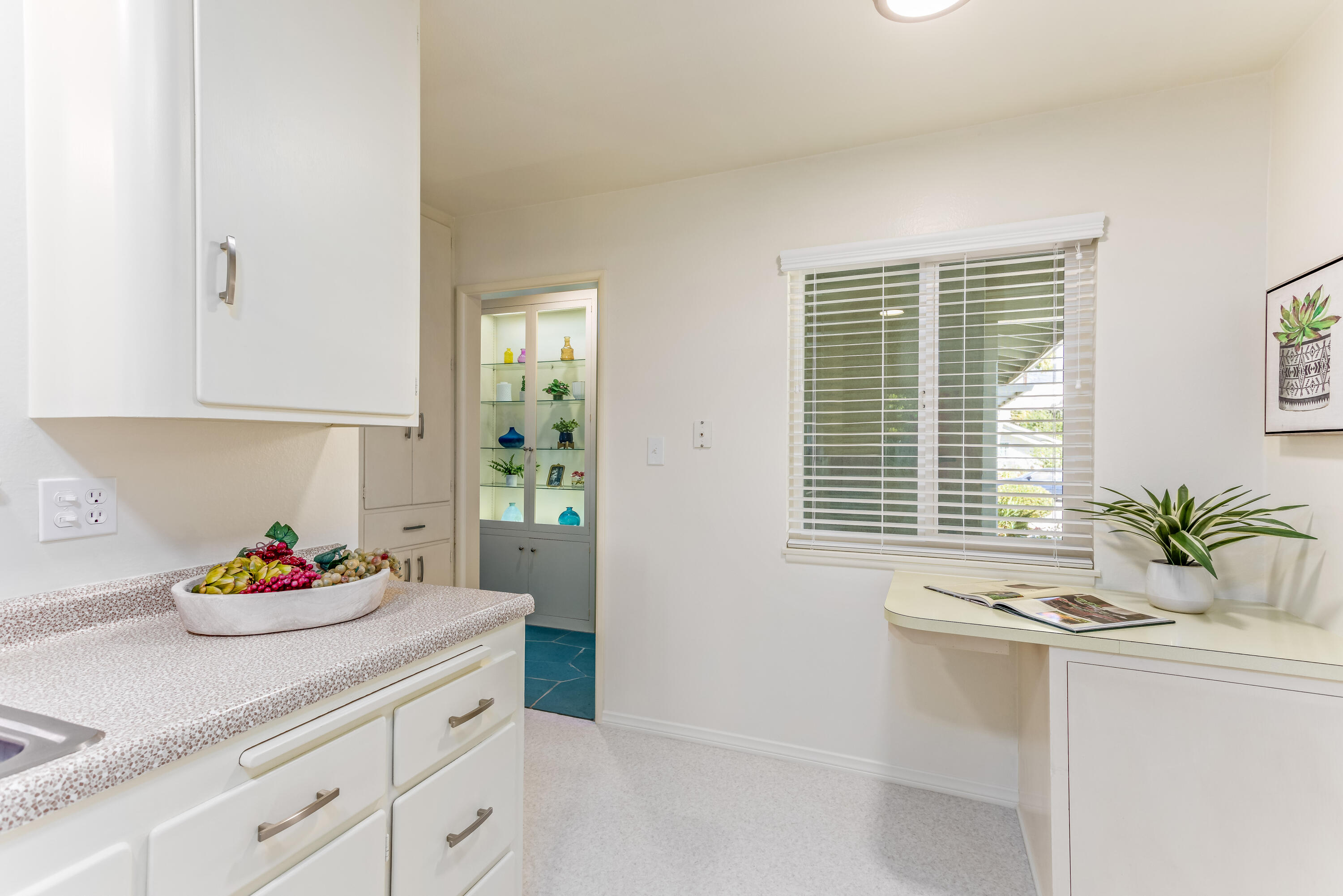 7111 Madera Drive Goleta, CA 93117 - Photo 11 of 24 a kitchen with a sink and window