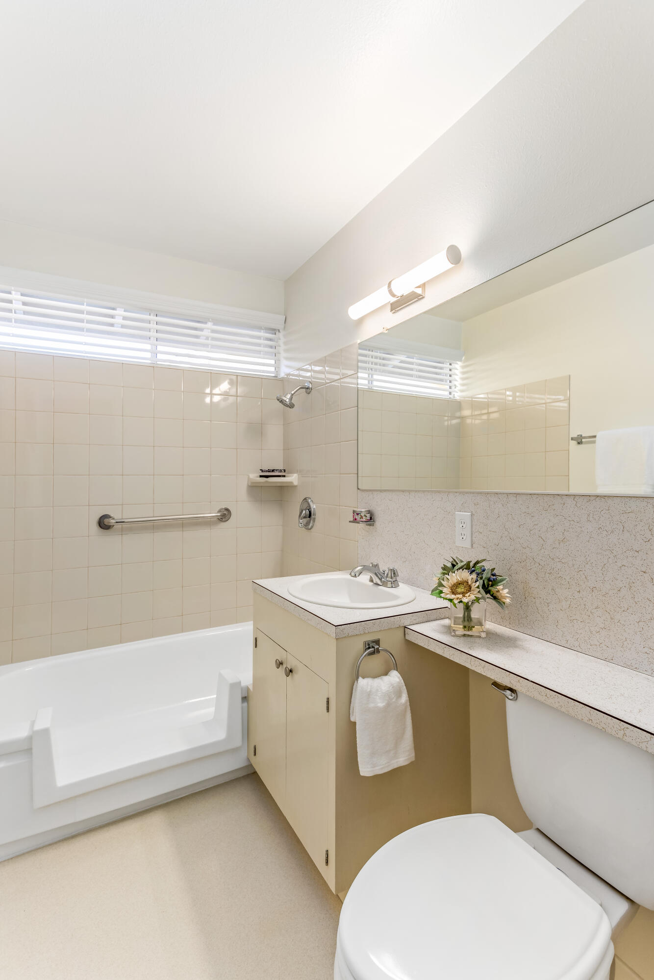 7111 Madera Drive Goleta, CA 93117 - Photo 12 of 24 a bathroom with a sink a toilet and bathtub