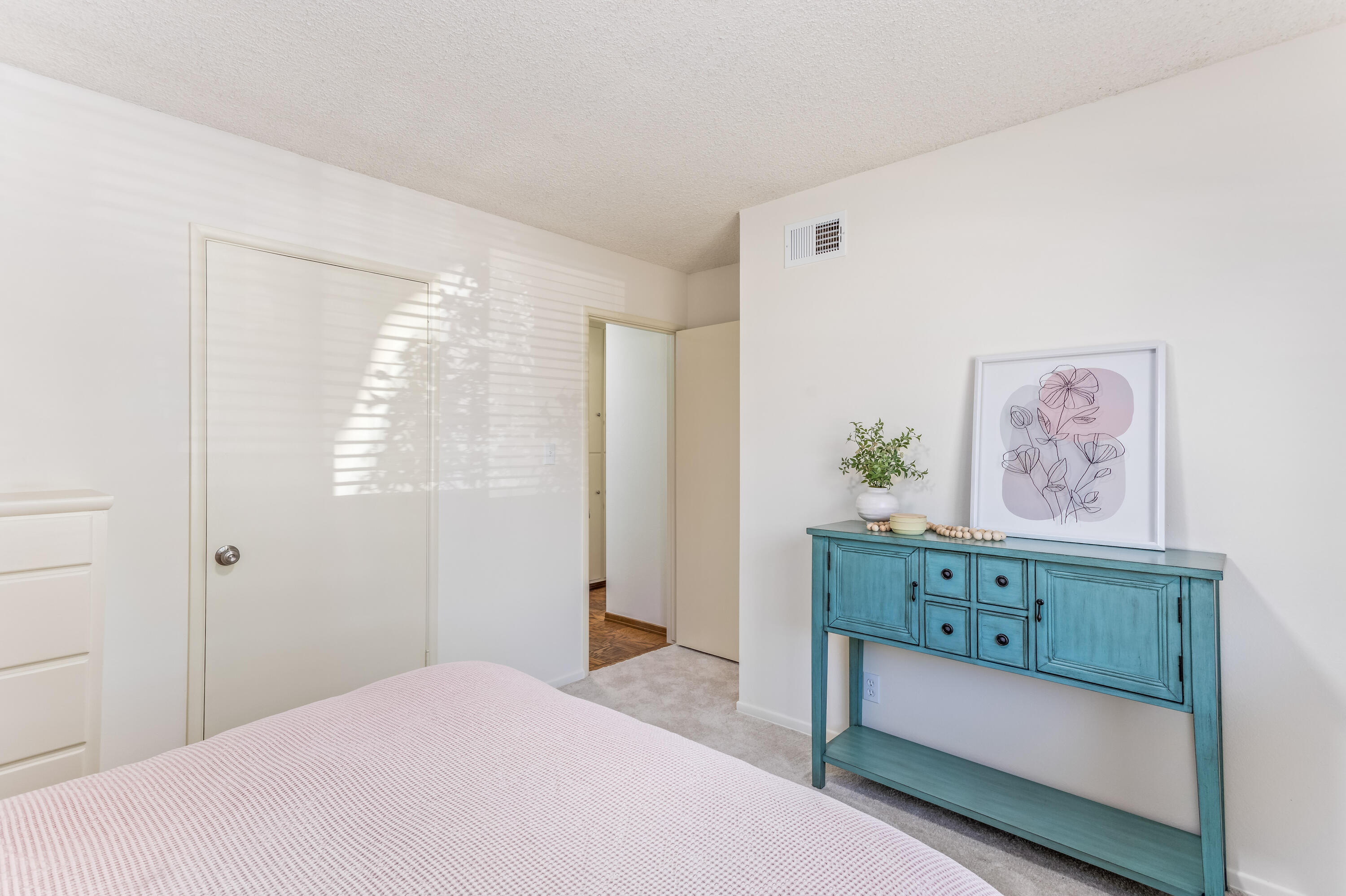 7111 Madera Drive Goleta, CA 93117 - Photo 14 of 24 a bedroom with a bed and a window