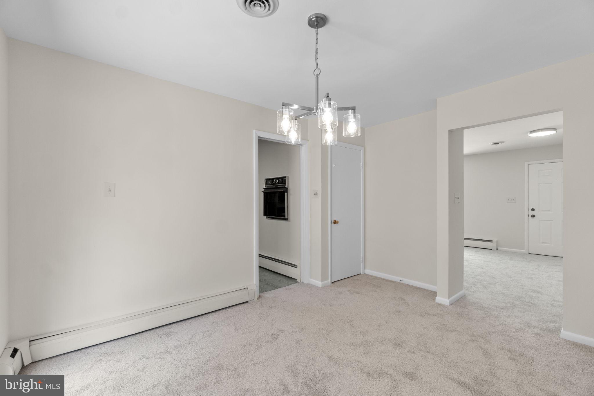 10770 West Crestview Lane Laurel, MD 20723 - Photo 12 of 49 Dining room connects the living room and kitchen