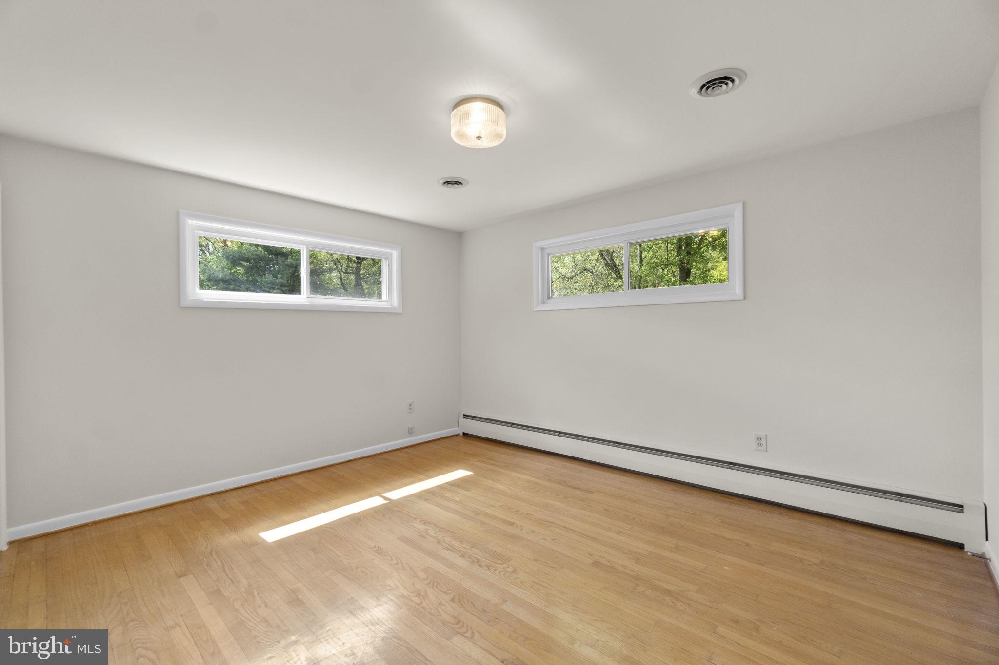 10770 West Crestview Lane Laurel, MD 20723 - Photo 19 of 49 Owner's suite with hardwood flooring