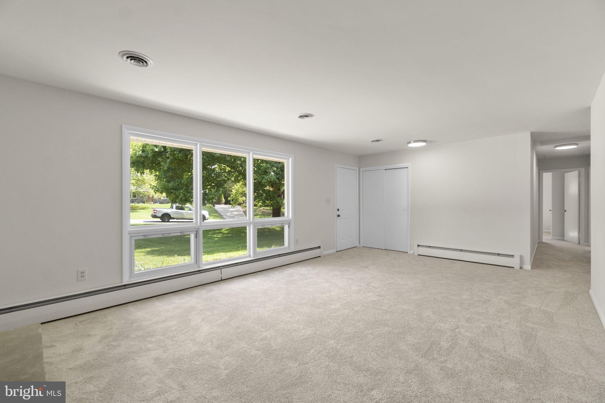 10770 West Crestview Lane Laurel, MD 20723 - Photo 7 of 49 Living room filled with natural light
