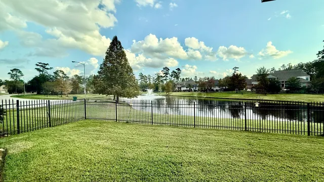 a garden view with a lake view