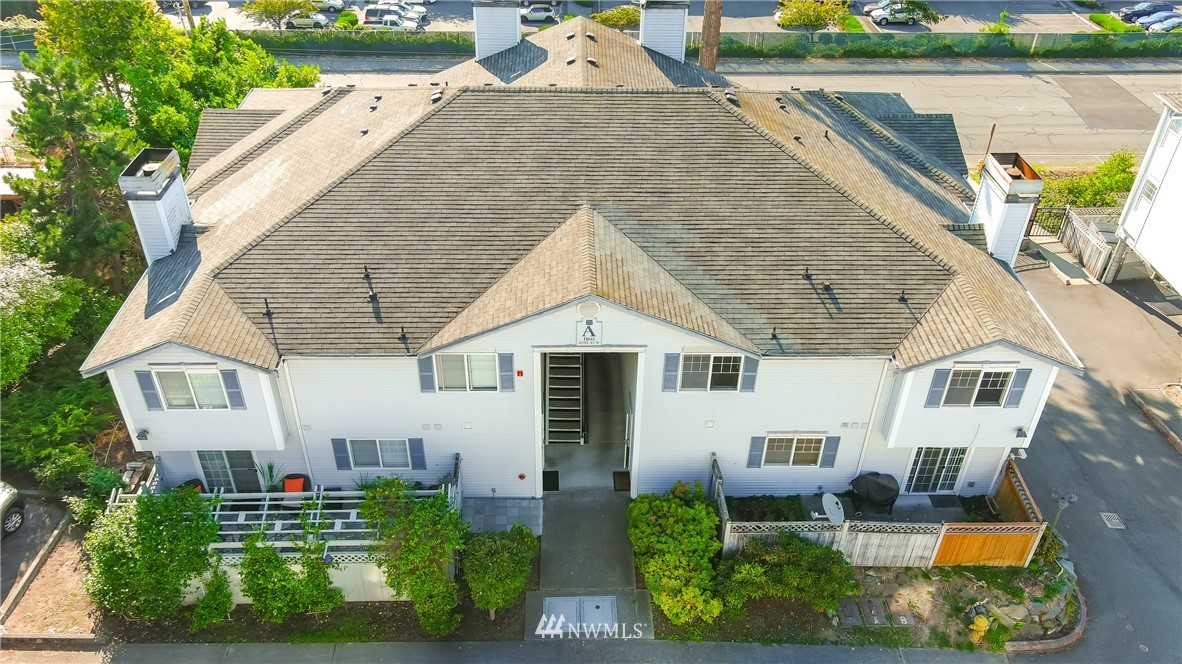 1160 Monroe Avenue Northeast, Unit A4 Renton, WA 98056 - Photo 24 of 26 an aerial view of a house with a yard and potted plants