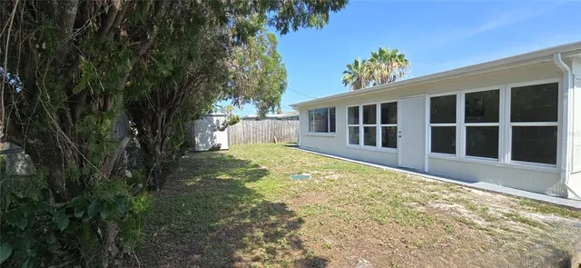 a front view of a house with stairs