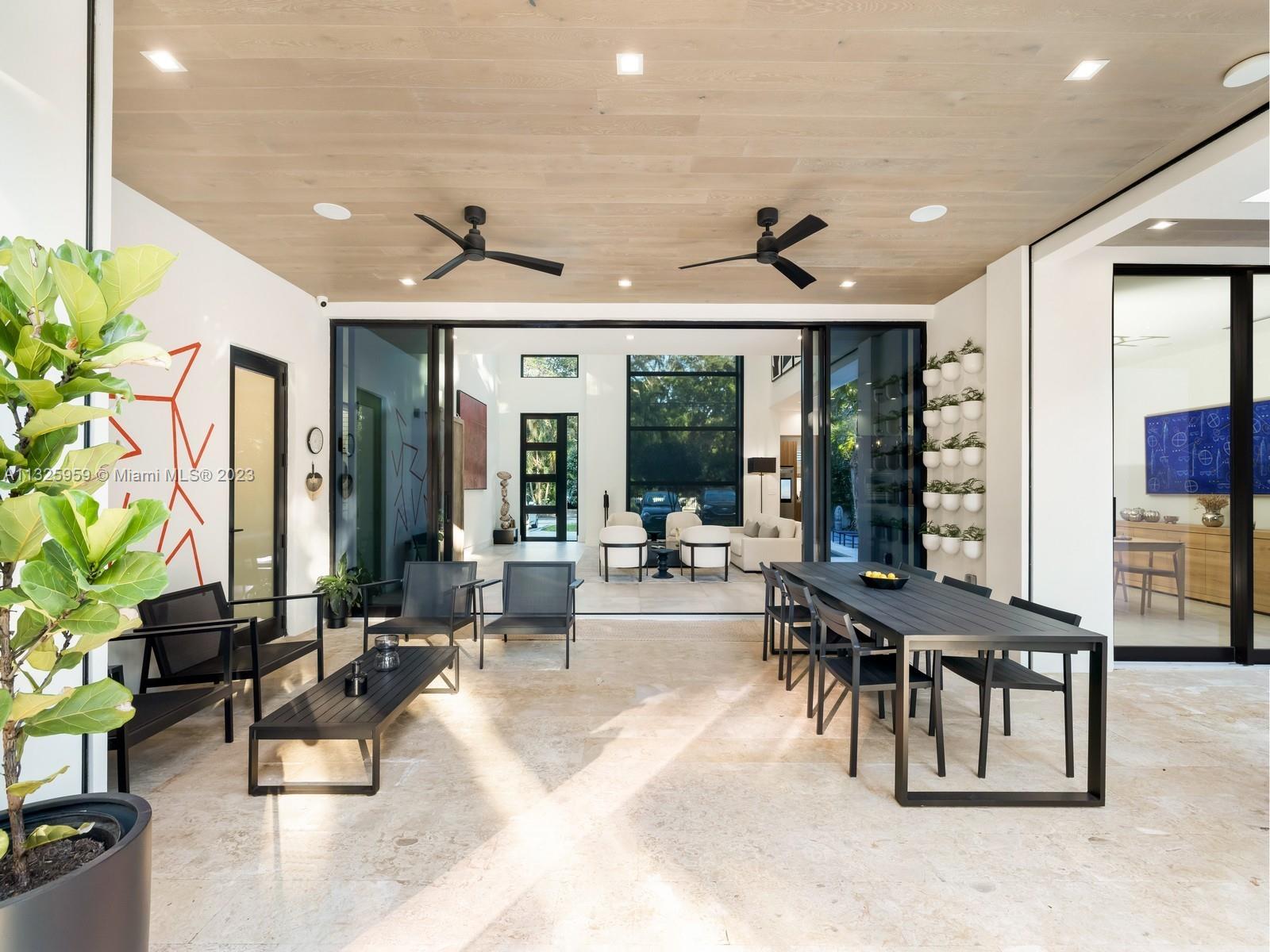 7260 School House Road Miami, FL 33143 - Photo 1 of 44 a view of a livingroom with furniture and window