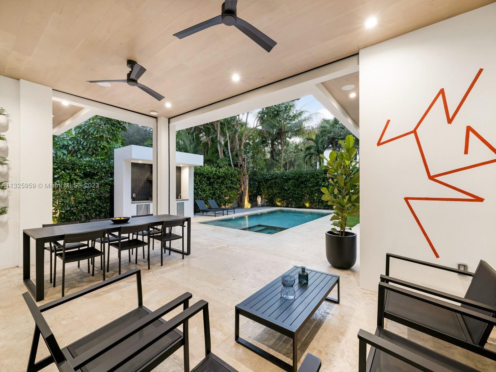 7260 School House Road Miami, FL 33143 - Photo 16 of 44 a view of a patio with swimming pool