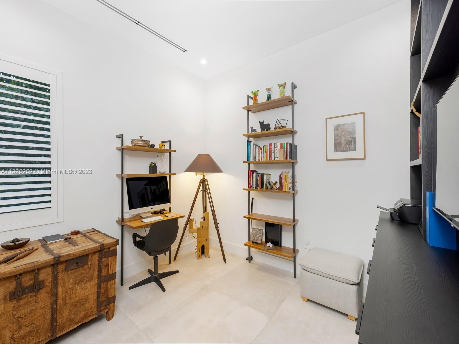 7260 School House Road Miami, FL 33143 - Photo 27 of 44 a view of a workspace with furniture and a window