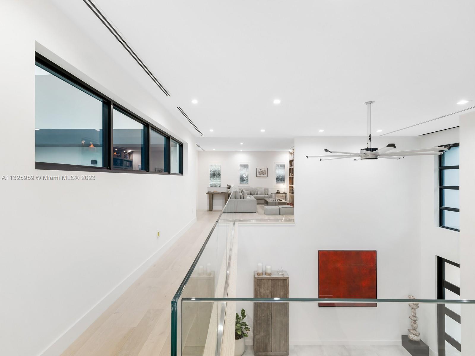 7260 School House Road Miami, FL 33143 - Photo 32 of 44 a view of a living room hardwood and kitchen