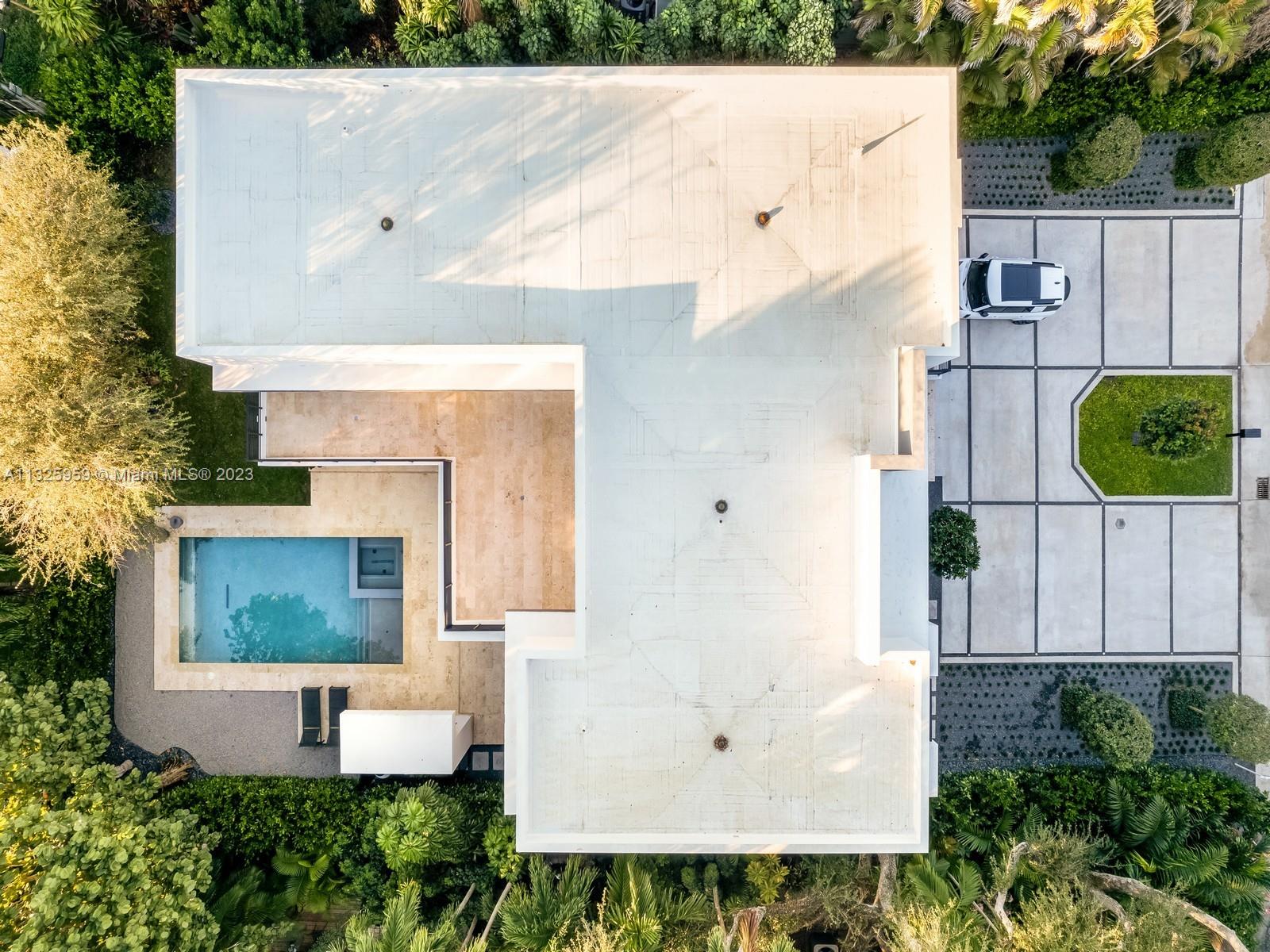 7260 School House Road Miami, FL 33143 - Photo 43 of 44 an aerial view of a house with swimming pool and large trees