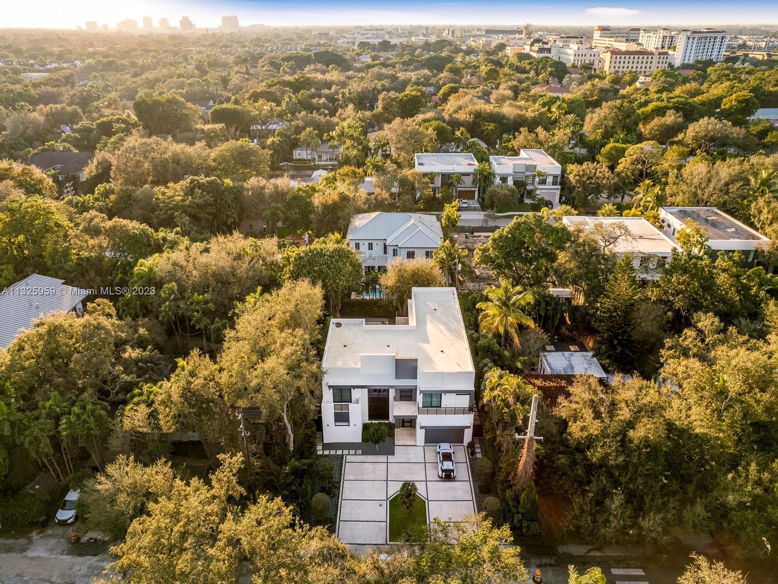 7260 School House Road Miami, FL 33143 - Photo 44 of 44 an aerial view of residential houses with outdoor space