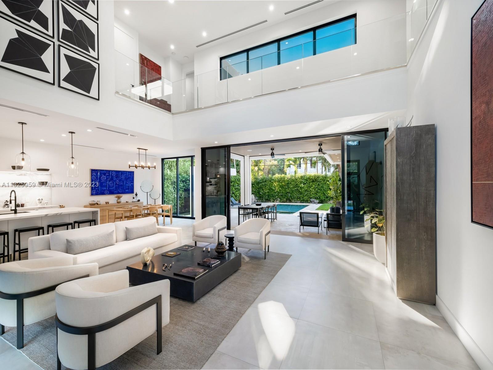 7260 School House Road Miami, FL 33143 - Photo 5 of 44 a living room with furniture and a large window
