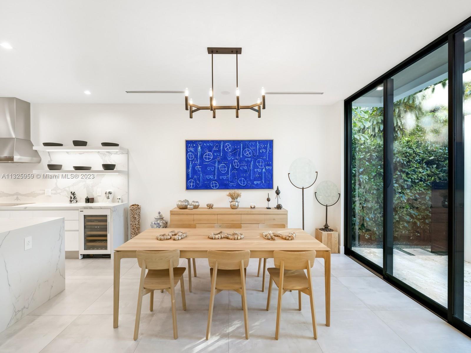7260 School House Road Miami, FL 33143 - Photo 8 of 44 a view of a dining room with furniture window and outside view