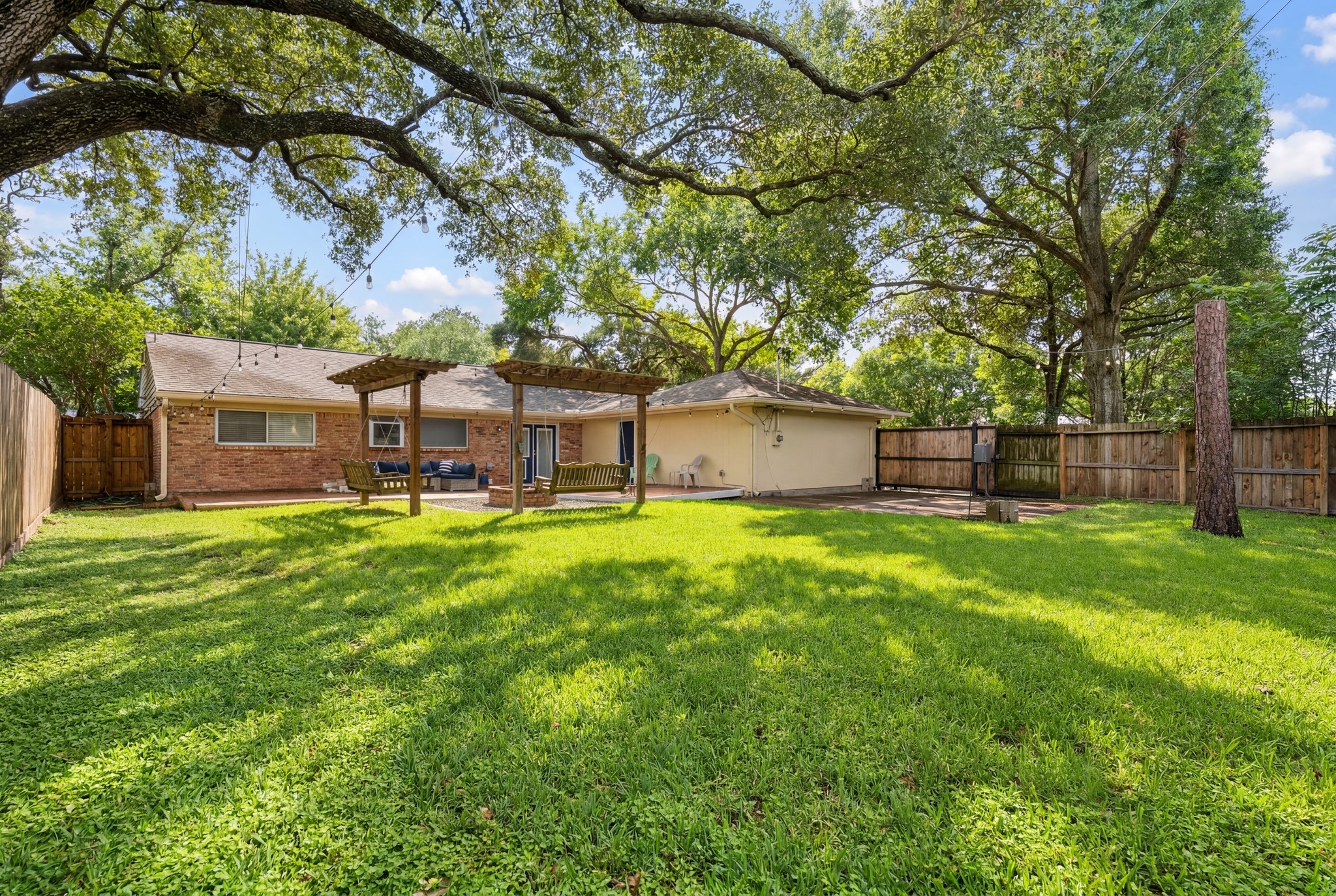 5658 Cartagena Street Houston, TX 77035 - Photo 25 of 33 Towering mature trees provide natural shade and privacy.
