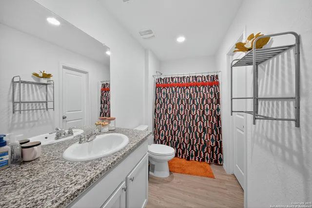 a bathroom with a sink and a toilet