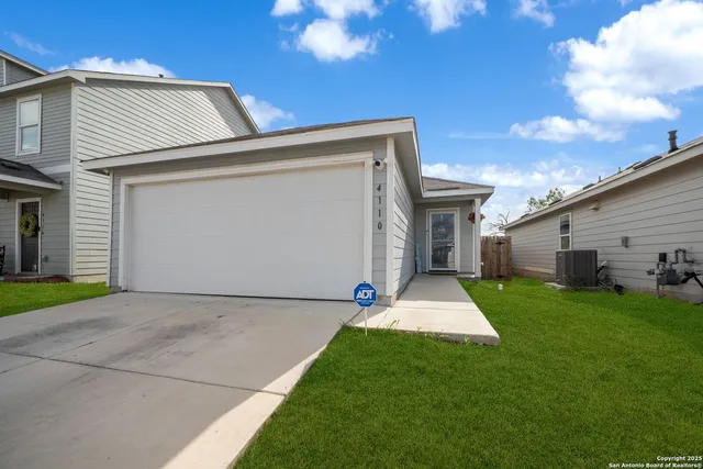 a view of a yard in front of a house